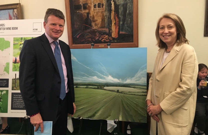 Richard Benyon MP and Newbury-based artist Jane Skingley at the WWF Picture England exhibition at Westminster.