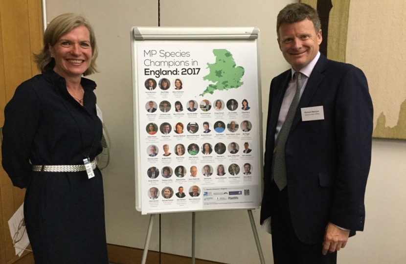 : Marian Spain, CE of Plantlife, and Richard Benyon MP with the list of MP Species Champions in England 2017.